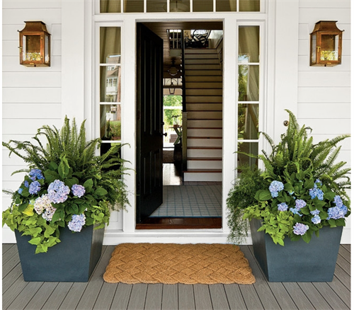 Great an inviting entry by adding symmetry to your layout Create a symmetry around your door for a warm welcoming.