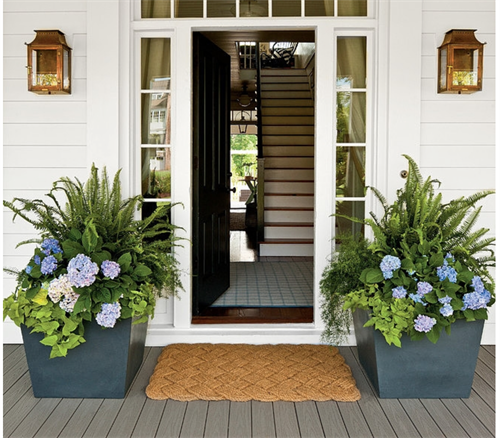 Create a symmetry around your door for a warm welcoming.