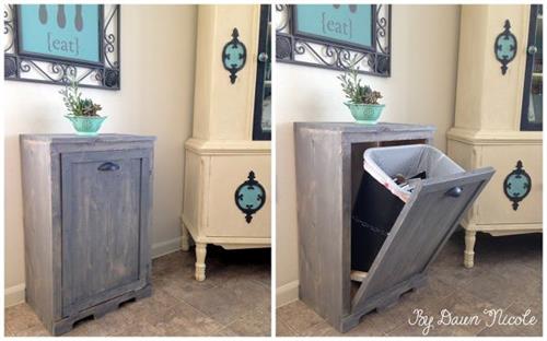 Hidden Waste Basket keeps clutter down Keep clutter down by adding a waste basket